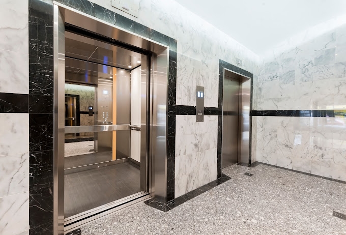 Upgraded elevator entrance in stainless steel, Lift Interiors