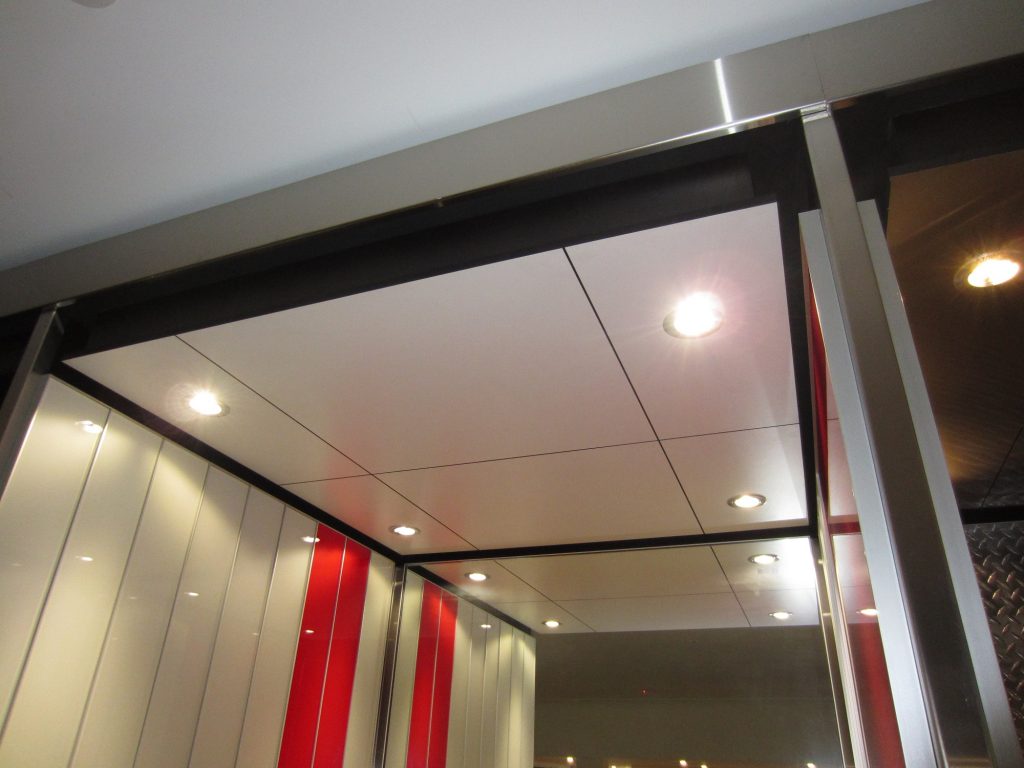 Electra Lift Interior, white laminate ceiling with 3mm shadow lines