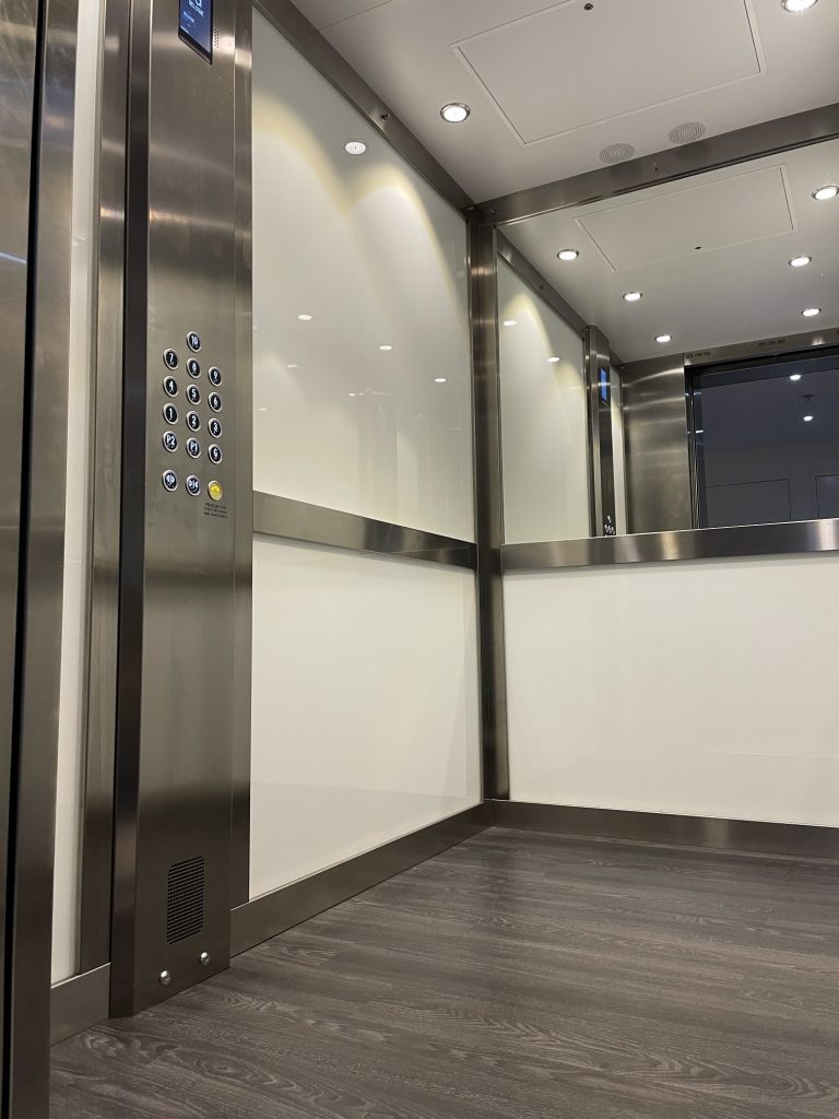 MRL interior, lift installation, white glass interior